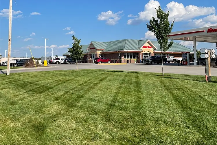 Property maintenance crew on a commercial lawn